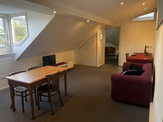 Living | Living room with sofa bed, desk and tv | 2 Bed Apartment | The Lodge on Elizabeth Hobart Tasmania Accommodation